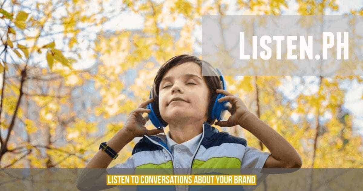 A child wearing sulit headphones with the text listen ph.