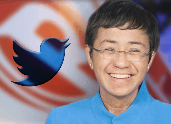 A woman with glasses smiling in front of a Twitter logo, showing support to Maria Ressa after court decision.