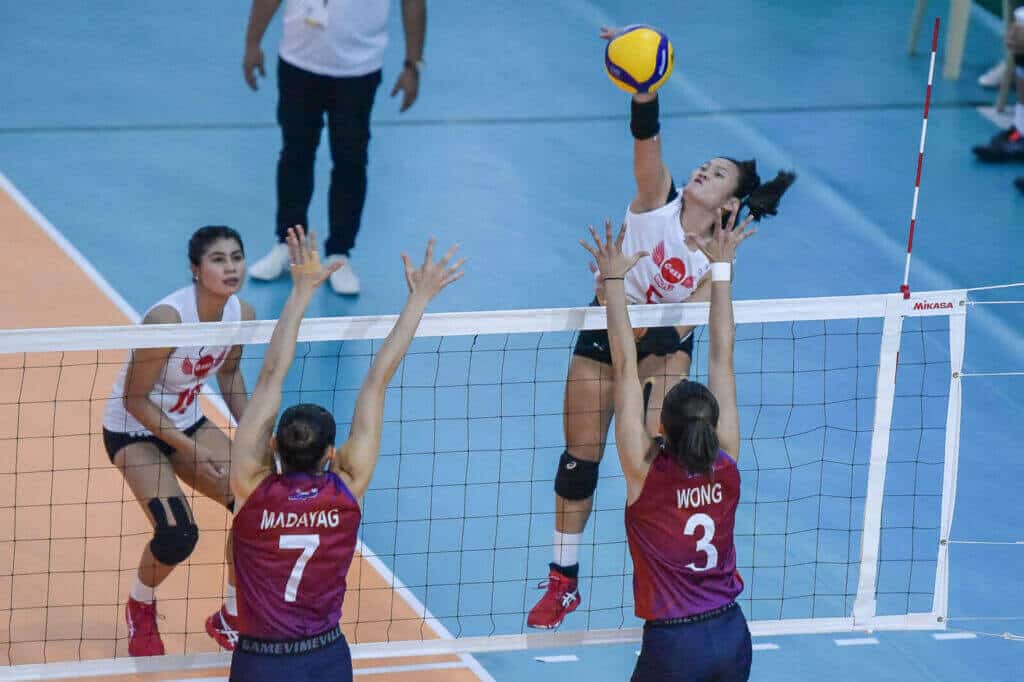 Female volleyball players, block.