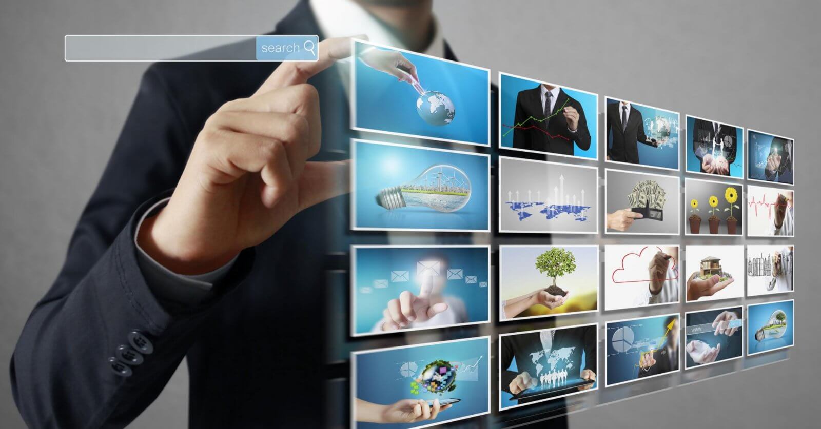 A person engages with a futuristic digital screen seamlessly navigating through a vibrant array of technology and business-related images akin to the ease of exploring free Pinoy movie streaming platforms