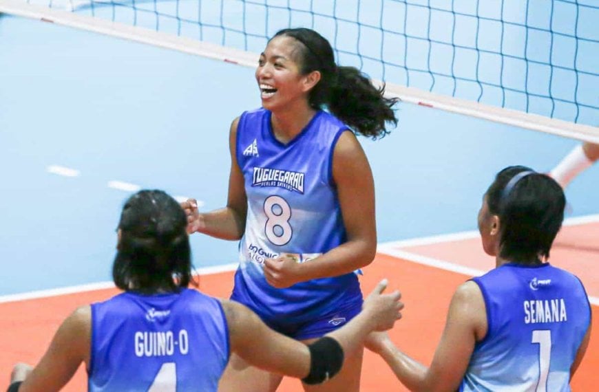 A group of female former Perlas Spikers celebrate a goal, having found a new home in PLDT.
