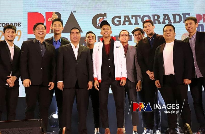 Keywords: men, photoDescription: Men posing for a photo on stage after Rey Suerte inks two-year deal with Blackwater.