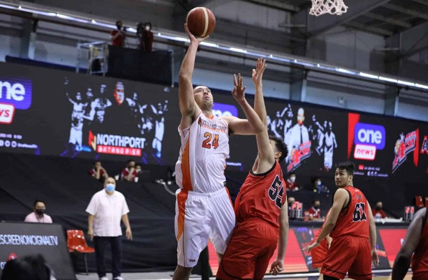 Greg Slaughter, former Northport big man, attempts to block a shot in a game.