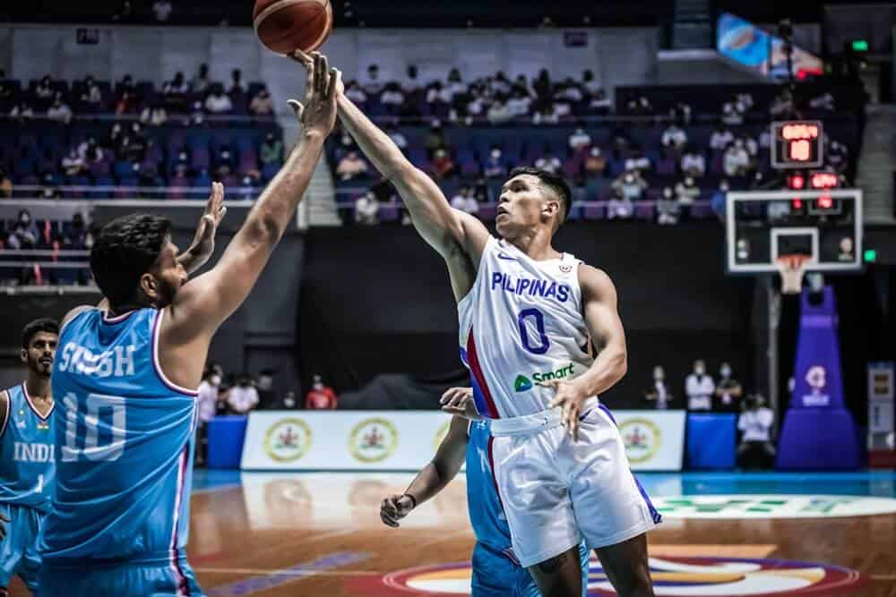 Basketball player blocks shot in Gilas blowout against India during FIBA World Cup Qualifiers.