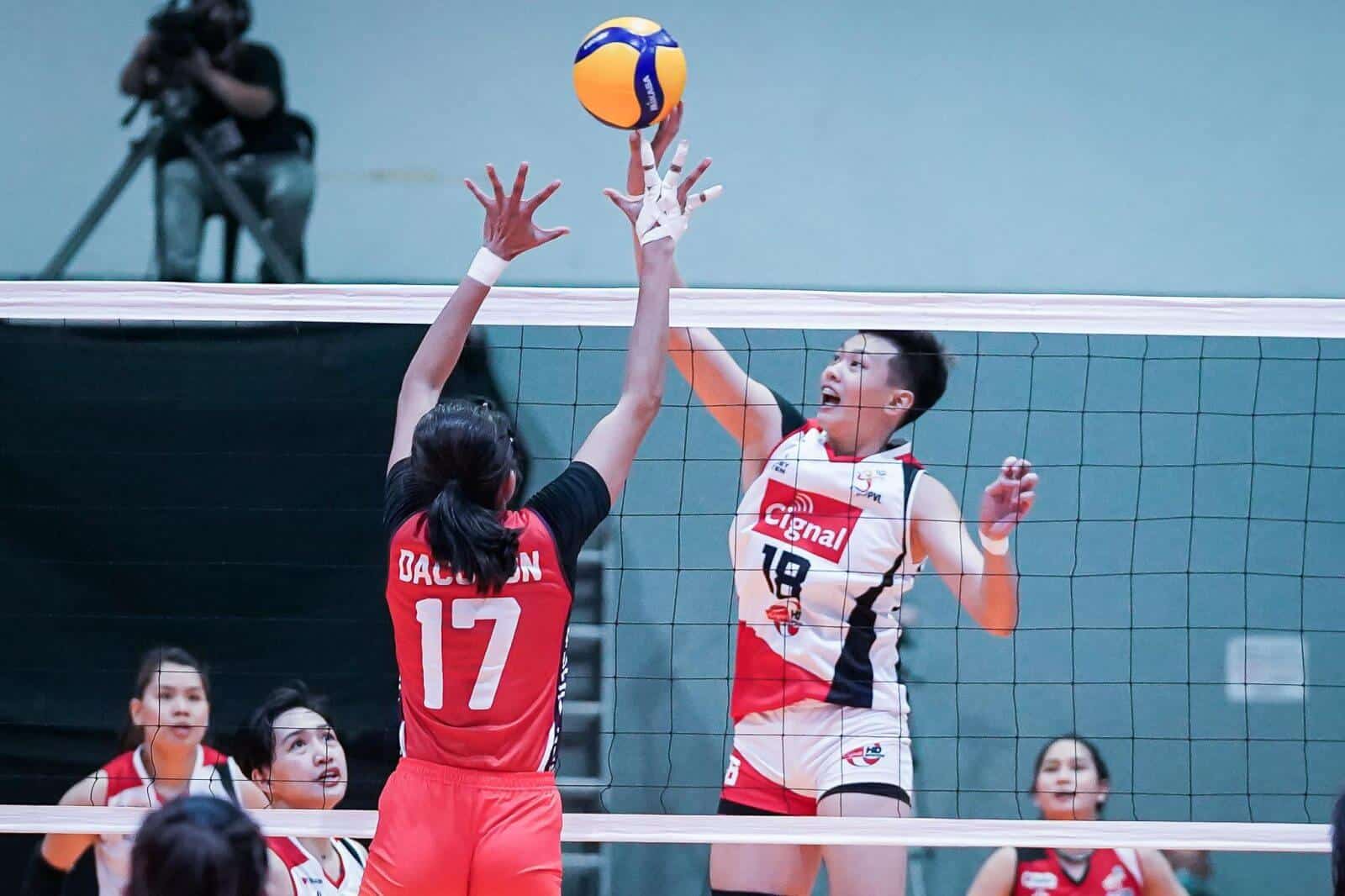 A volleyball player blocks a ball in the PVL Open Conference 2022.