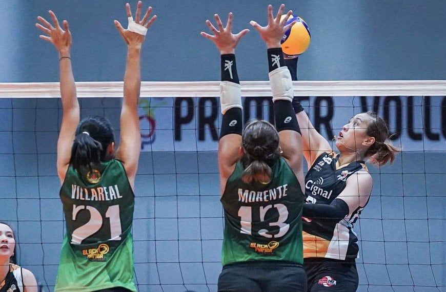A group of female volleyball players blocking the ball during a sweep in the PVL Open Conference.