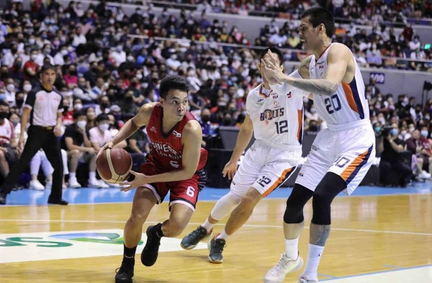 A basketball player is dribbling the ball on a court in the PBA Governors' Cup.