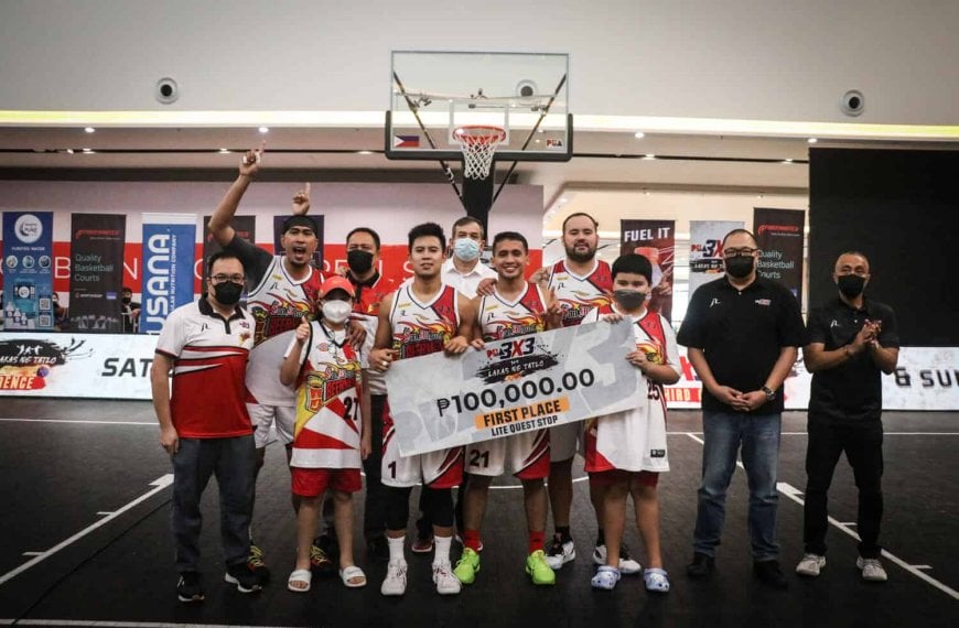 A group of basketball players claiming Leg 5 title in PBA 3x3 pose for a picture.