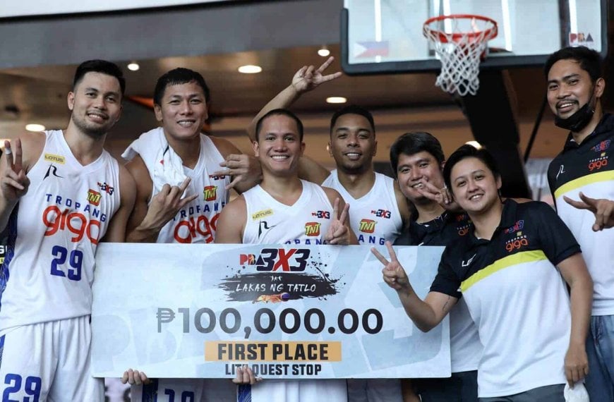 A group of basketball players posing for a picture after winning the PBA Third Conference Leg 3 title.