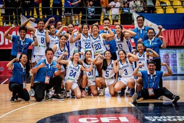 A group of basketball players posing for a photo after winning bronze medal in FIBA U-16 Women's Asian Championship.