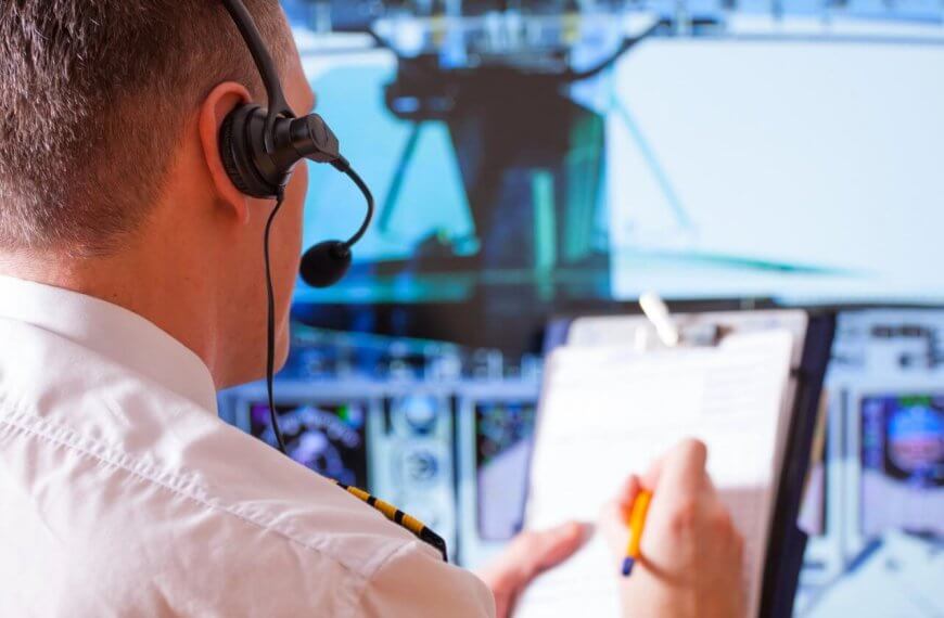 A man wearing a headset and holding a pen at an Aviation Dreams event in the Philippines.