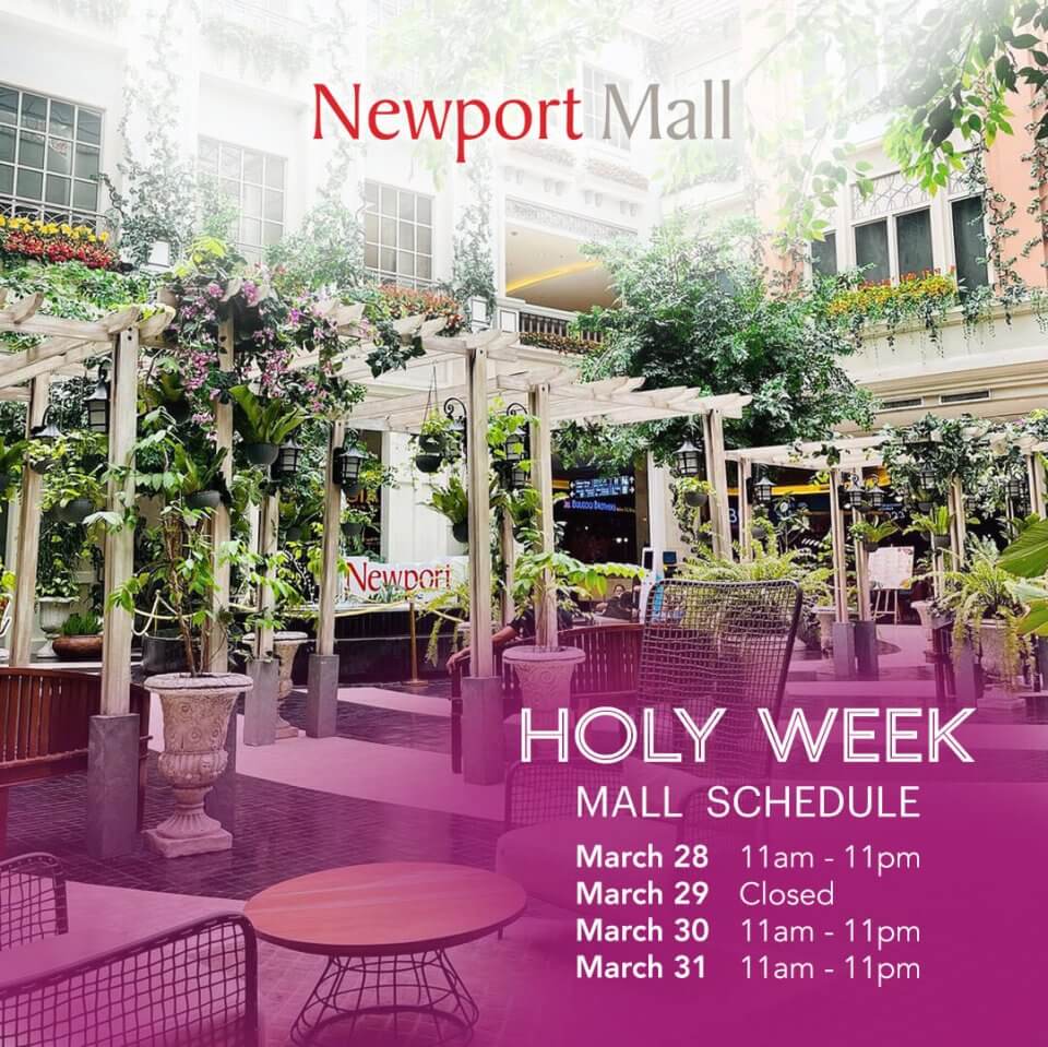 Holy week hours posted for newport mall, featuring an outdoor seating area decorated with greenery.
