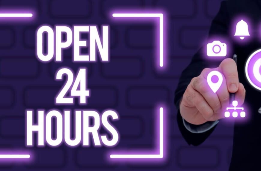 A person in a dark suit taps a glowing purple pinpoint icon on a virtual screen. Surrounding icons include a camera, bell, volume, power button, and a graphic of connected nodes. The text "24 HOUR DINING" is prominently displayed, also in purple, against a dark background with a brick pattern.