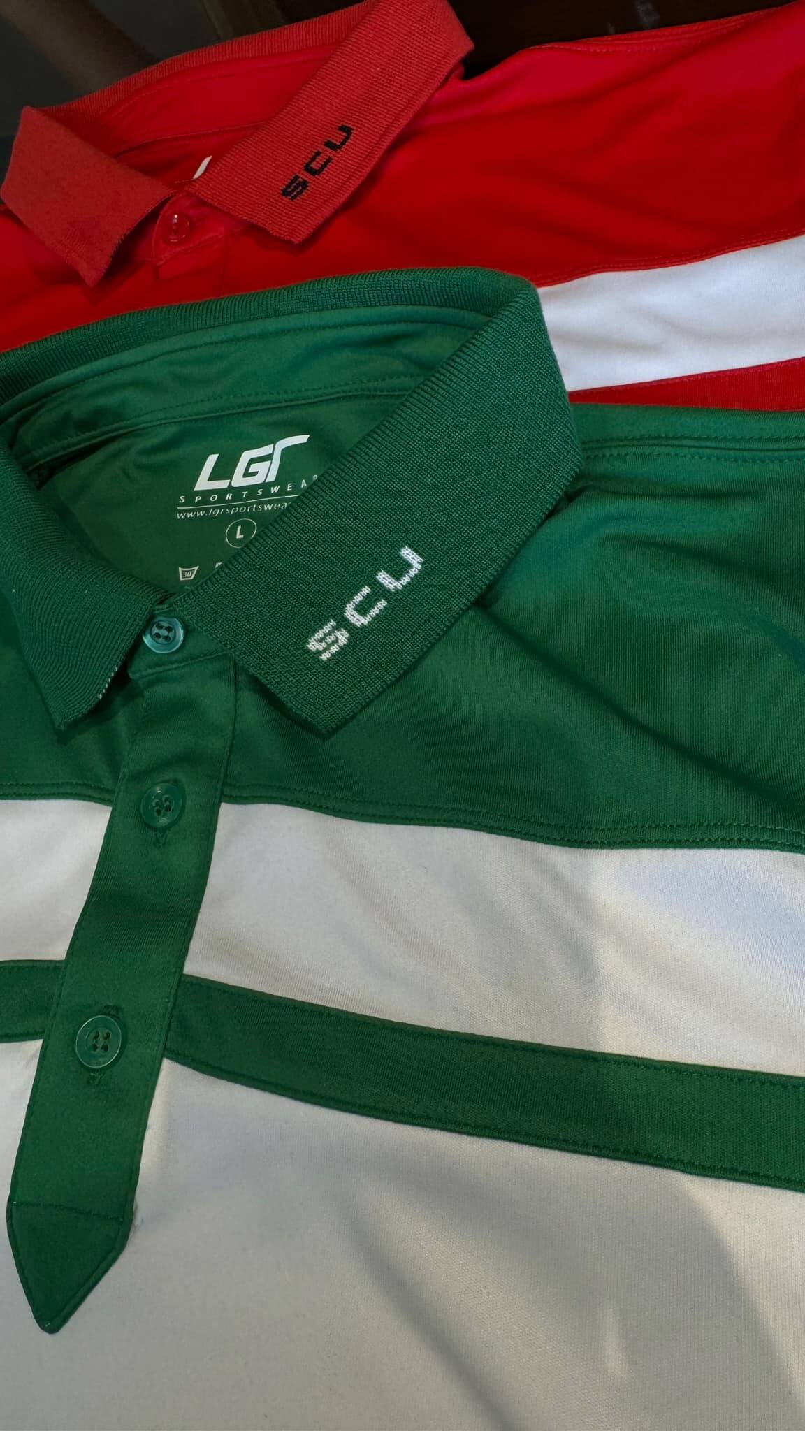 Two polo shirts are laid out vertically. The top shirt is red, and the lower shirt is green with a white horizontal stripe. Both shirts have the acronym "SCU" embroidered on their collars. The green shirt also has buttons and a label indicating it is from the brand "LGI," known suppliers of custom uniforms in Metro Manila.