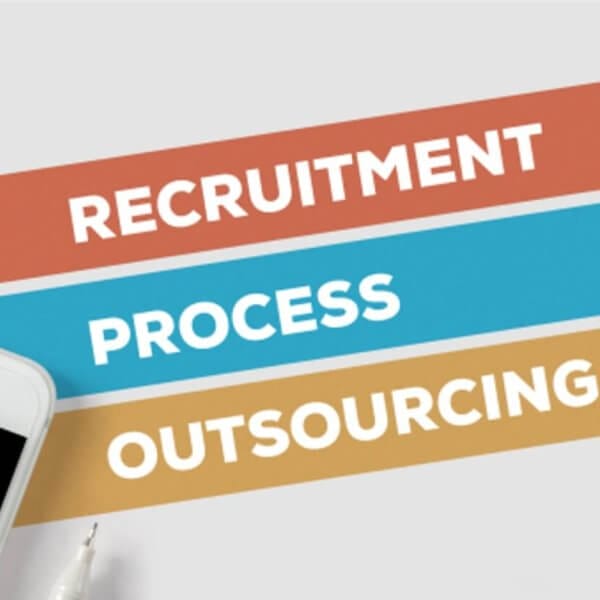A smartphone and pen sit beside horizontal bars labeled Recruitment, Process, and Outsourcing on a white background, evoking the synergy of BPO operations in dynamic hubs like Bonifacio Global City.